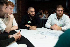 Transformation vs. stability: Maintaining stability through periods of change - analysts working together