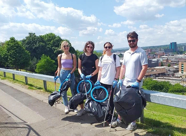 Alt='Litter picking in Sheffield as part of the sustainability initiative'